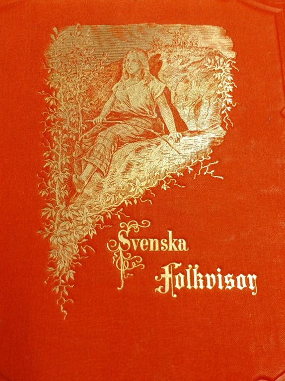 Röd pärm med texten och en bild av en sittande kvinna etsade i guld